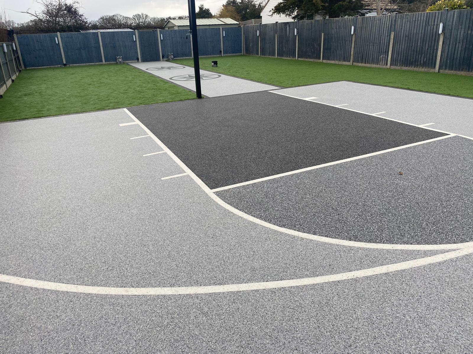Resin bound basketball court and decorated pathways