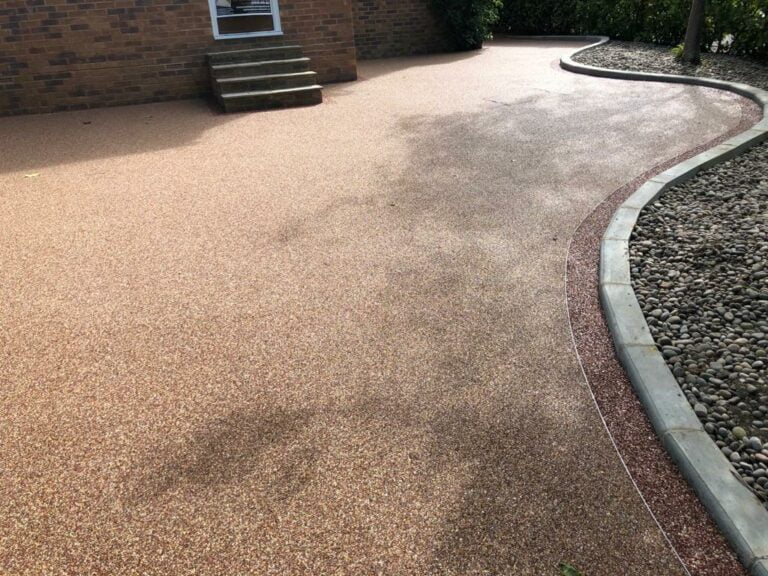 Beautifully colourful resin bound driveway and surround
